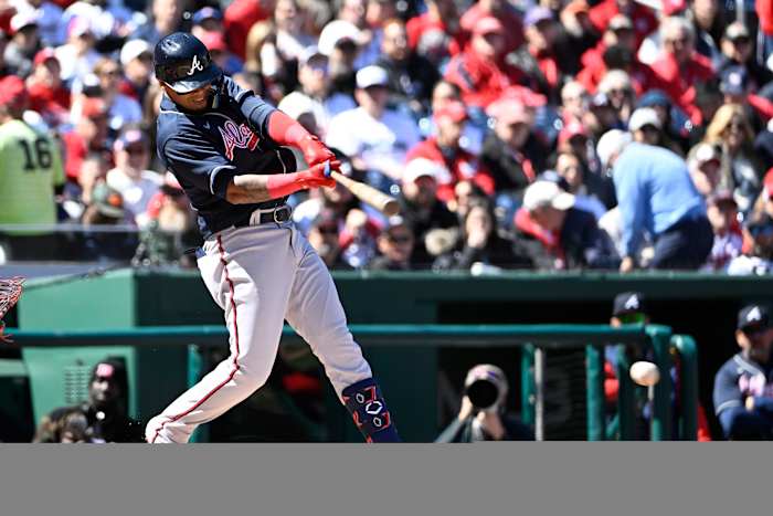 Mar 30, 2023; Washington, District of Columbia, USA; Atlanta Braves second baseman Orlando Arcia (11) hits an RBI single against the Washington Nationals during the second inning at Nationals Park. Mandatory Credit: Brad Mills-USA TODAY Sports